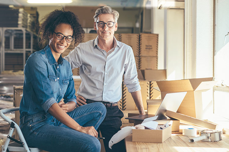 man and woman in warehouse